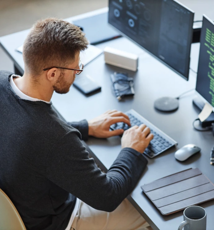 Software developer at a workstation